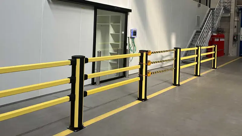 black and yellow pedestrian barriers 